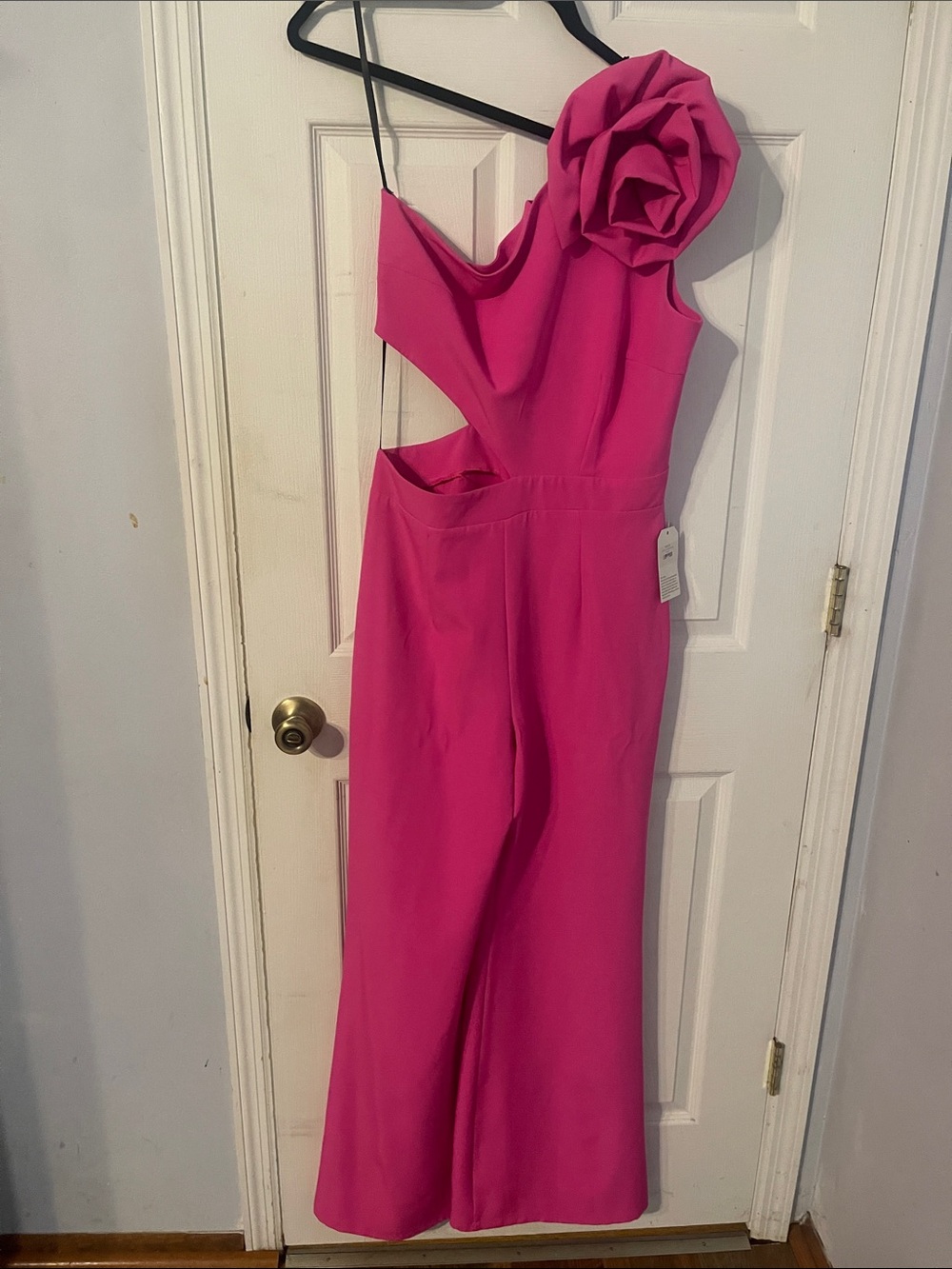 One-Shoulder Fuchsia Jumpsuit with Floral Accent